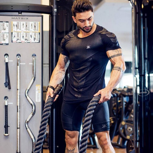 Fitness clothing coach sports t-shirt muscle tights male brother high-elastic training quick-drying clothes short-sleeved fitness clothes men